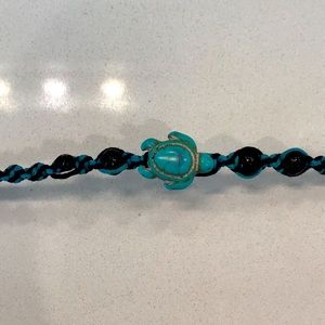 Blue and black braided bracelet with beads, 13”